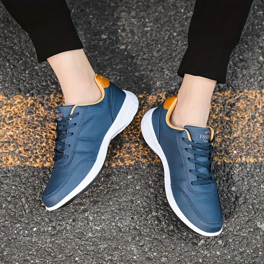 Like New Women’s Navy & Gold Waterproof Sneaker